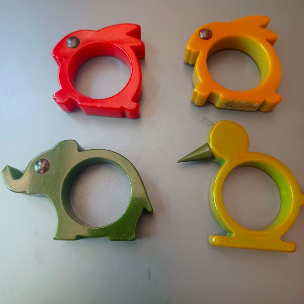 1 of 4 Bakelite like Animal Napkin Rings